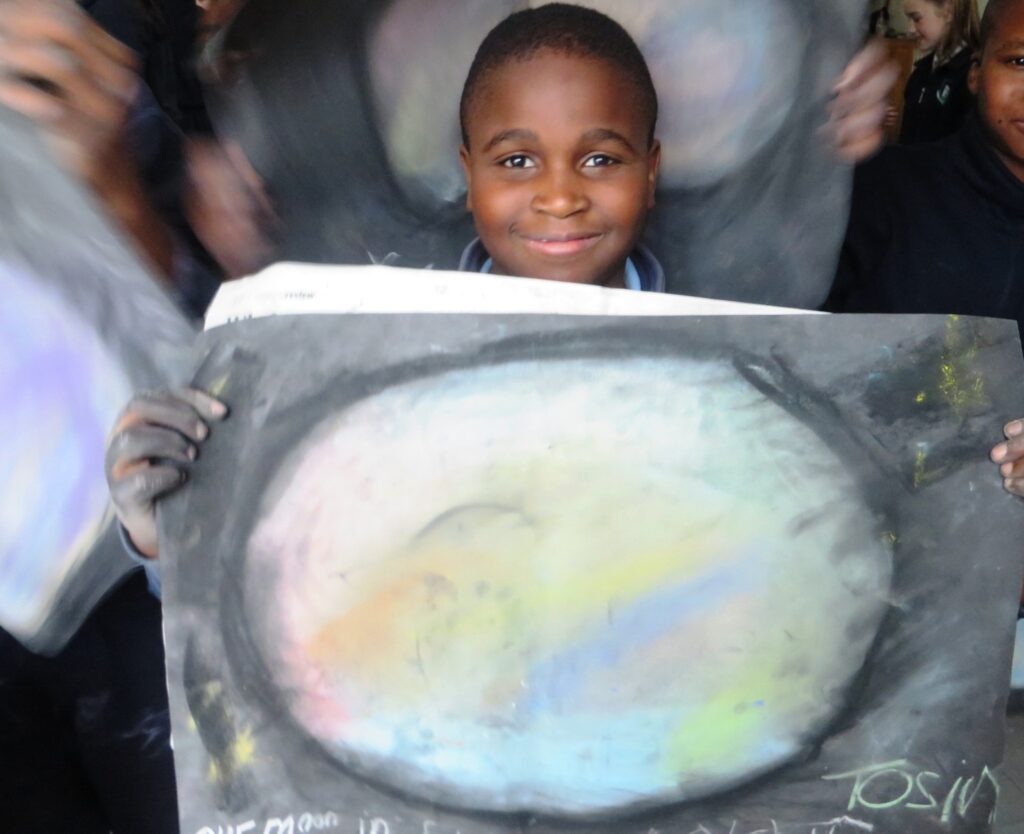 A superb impressionistic drawing of our moon in false colour.A young boy from Lusk NS Dublin shares his joy. 