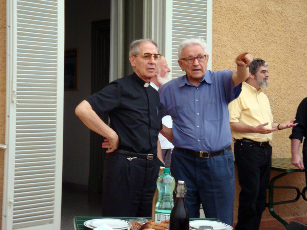 Fr. Nicholás, head of the Jesuits, chatting with Fr. Maffeo, retired physics teacher, at our old headquarters in the Papal Palace, back in 2008