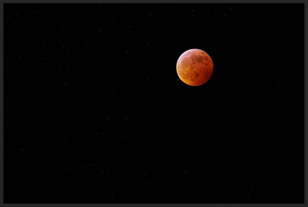 All of these photos show not just the eclipsed moon, but the stars.