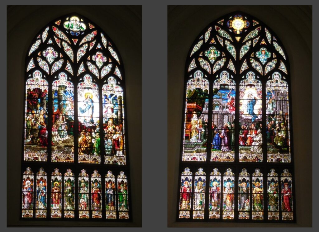 Large windows in the Denver Cathedral.  These stand opposite each other in the church.  Note the row of saints across the bottom of each.