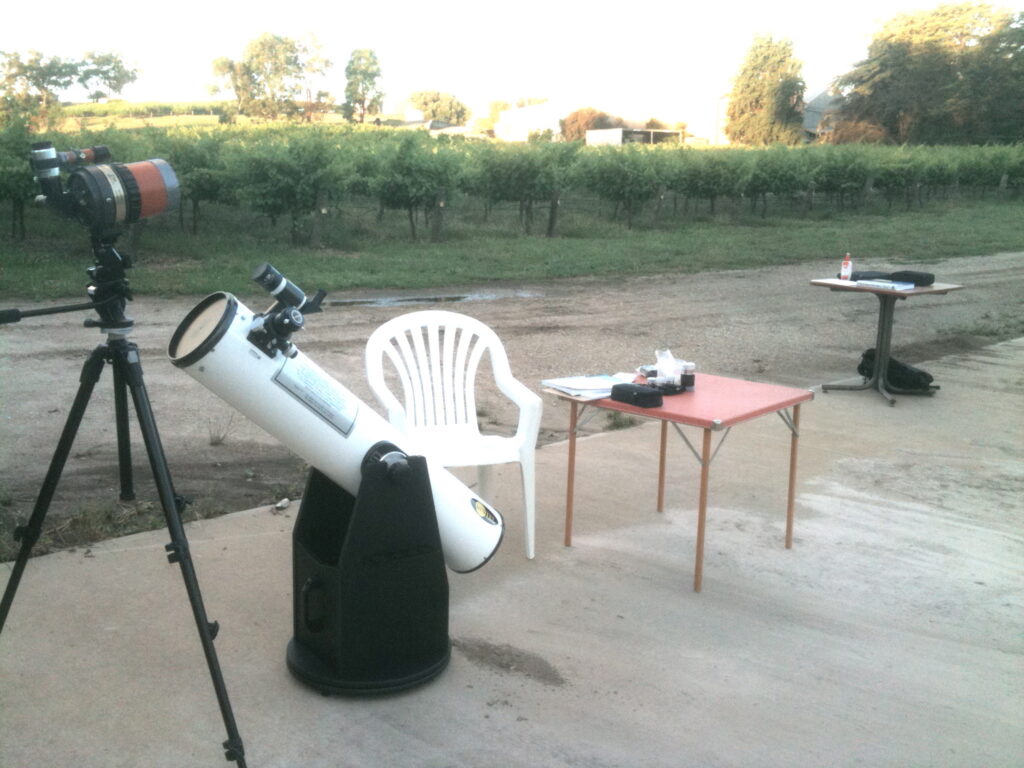 We set up our telescopes by a vineyard in Sevenhill. The little orange C-90 is the telescope I took to Africa in 1984. The white Dobsonian was donated to the Jesuits by Mike Smith of Bintel telescopes in Sydney 