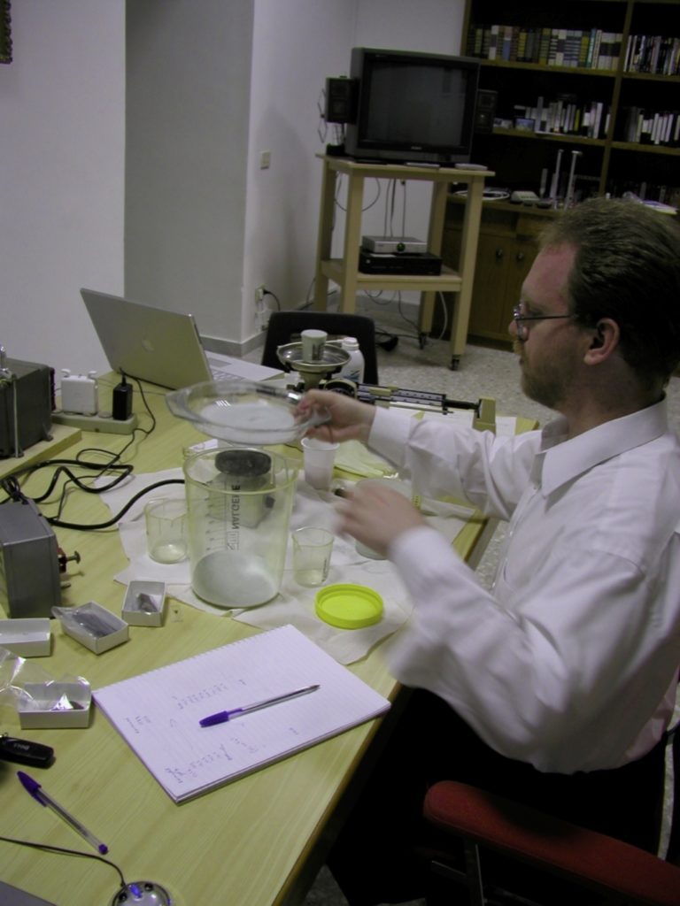 This is Bob Macke in 2004 or so, making measurements in the classroom at our old quarters in the papal palace. Why had we taken over the classroom for our work? Because, unlike the lab, it was air conditioned...