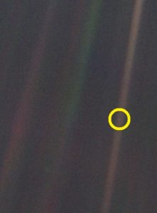 Photograph of planet Earth taken on February 14, 1990, by the Voyager 1 space probe from a distance of about 4 billion miles.