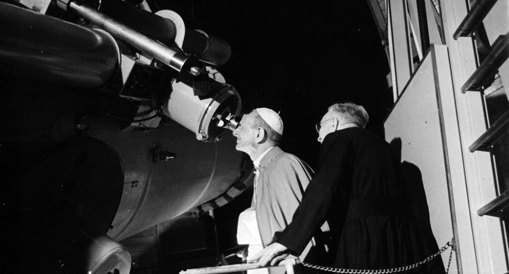 Pope St. Paul VI looking at the moon through the Vatican Observatory's Schmidt telescope, July 20, 1969.