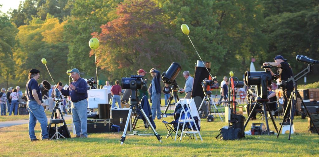 Solar telescopes everywhere at the Kensington Astronomy at the Beach event. Bob Trembley (left) is speaking with Mark Kedzior. Credit: Doug Bock.