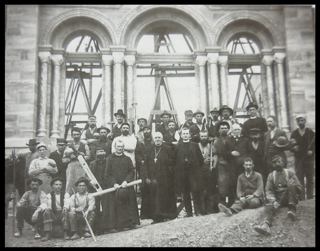 Photo from the 2004 book To Prefer Nothing to Christ: St. Meinrad Archabbey 1854-2004, showing “construction workers for the Abbey Church, 1900-1904”. While most histories do not provide much information about people such as stonemasons, To Prefer Nothing to Christ does contain some information about those who built the abbey, in its chapter on the construction of the abbey church. For example, it mentions “the head oxen driver, John Tuchscherer, who by the mere roar of his mighty voice and a crack of the whip was able to persuade his two, sometimes, three, and even four yoke of oxen to move the heaviest stone over the muddiest roads (if roads they should be called) and up the steep hill to the building site [p. 458].” Clearly John Tuchscherer had, in his own way, studied and tested nature to see how things work, and to determine what was true.