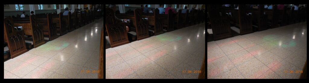 The ‘Light of Truth’ illuminating the aisle near the back of church, on June 17. This sequence of photos shows the blue-green circle moving across the aisle in the minutes prior to 10:30 AM. The light actually reached the center of the aisle for the ‘Moment of Truth’ at just about 10:30 AM.