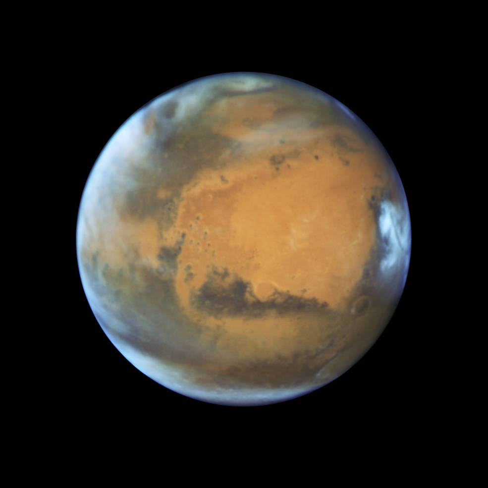 Hubble Space Telescope photo of Mars taken on May 12, 2016, nearing opposition. Credits: NASA, ESA, the Hubble Heritage Team (STScI/AURA), J. Bell (ASU), and M. Wolff (Space Science Institute)