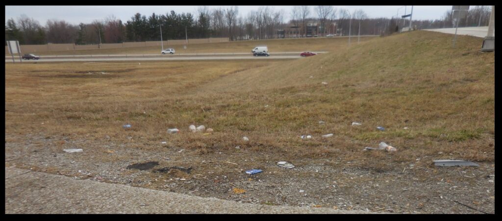 Cars stop when they get off the exit, and food containers go out the window.