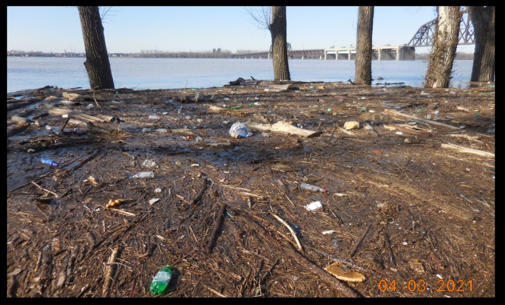 Remarkably, bald eagles can on occasion be seen resting in the tops of the riverside trees in this photo and the two below it. The Ohio River Valley is an amazing place, despite everything. In terms of industrial waste and untreated sewage, the river is far cleaner that it was fifty or seventy years ago. But the litter load that currently comes down it is incredible. 